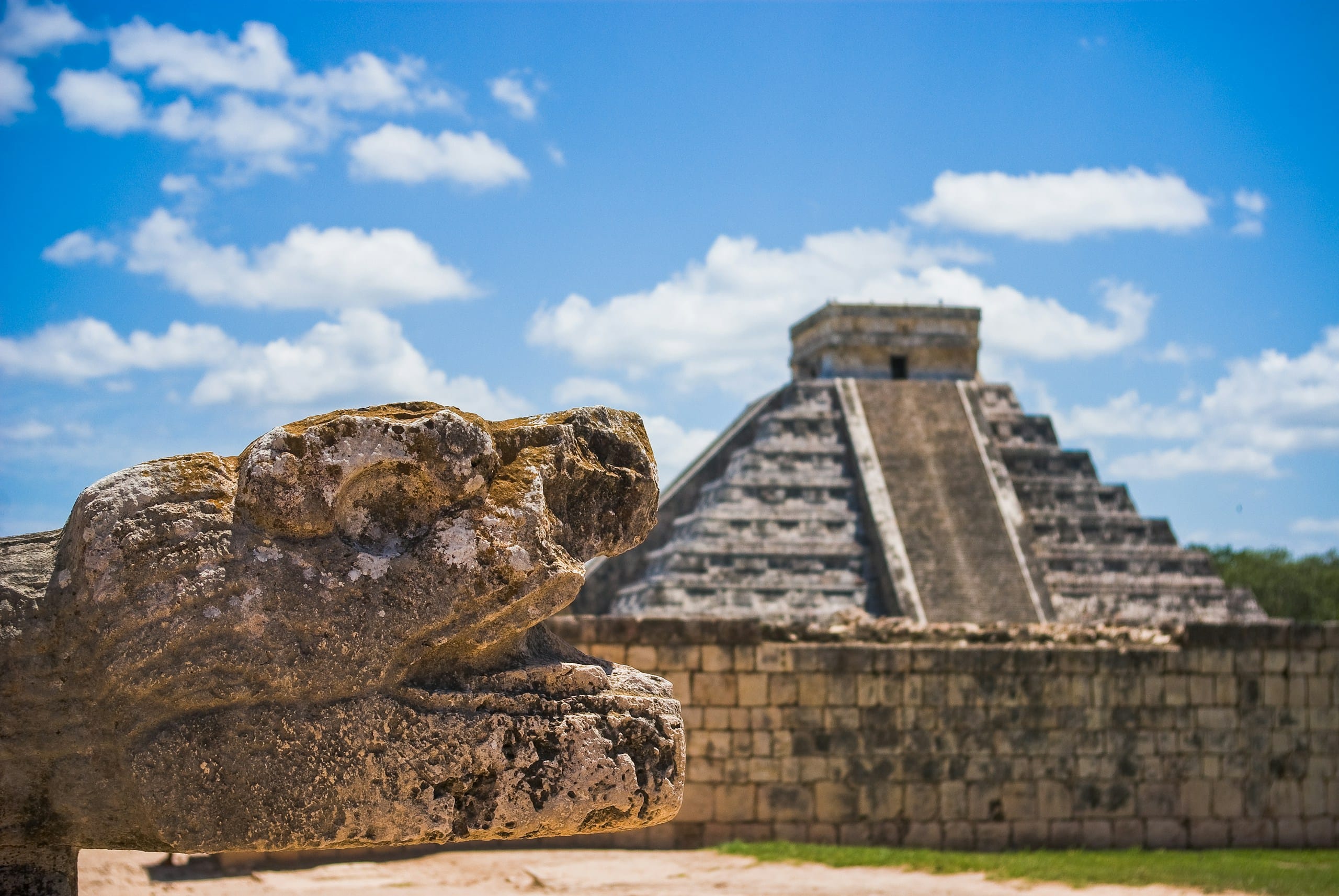 A stone serpent head at the foot of El Castillo, Chichen Itza